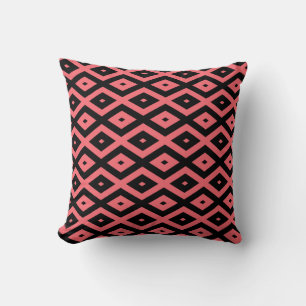 Coral and black diamond pattern cushion
