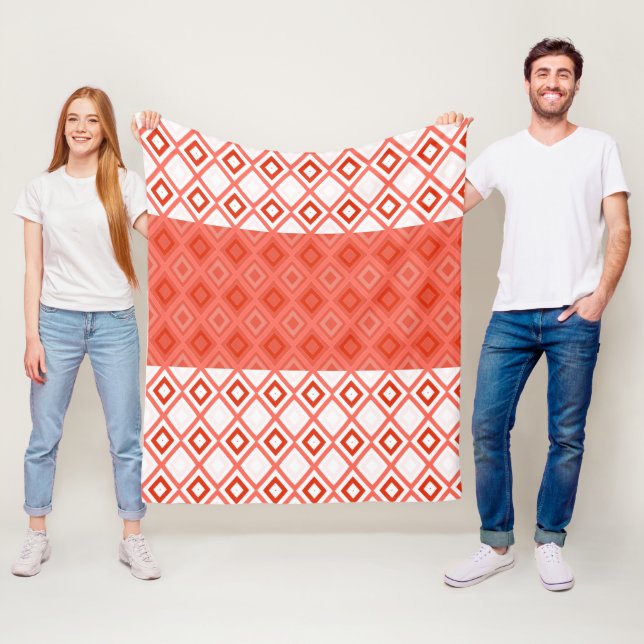Coral and Orange Patterned White Fleece Blanket (In Situ)