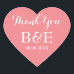 Coral heart shaped wedding favour thank you sticke heart sticker<br><div class="desc">Coral heart shaped wedding favour thank you stickers. Coral pink and white or custom background colour. Elegant script typography. Use as romantic envelope seals / sealers or as monogrammed wedding favour label for thanking guests. Cute love symbol shape with stylish text. Also handy for other occasions like engagement party, anniversary...</div>