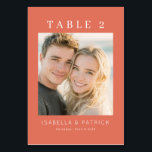 Coral Moderne Wedding Table Number<br><div class="desc">This is a warm and inviting image featuring a romantic beach wedding theme. The photo captures a loving couple with soft, natural lighting that highlights their joyful expressions against the serene backdrop of the ocean. The color palette includes soothing peach tones and gentle pastels, creating an intimate and affectionate mood....</div>