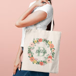 Coral Pink Floral Greenery Monogram Wreath<br><div class="desc">Whimsical floral custom tote bag design features beautiful watercolor flowers and greenery in a round wreath that frames your custom monogram name and initial. Colours include blush pink, coral orange, yellow, and violet flowers with lush sage and darker green foliage and leaves. Makes a lovely gift for your bridesmaids and...</div>