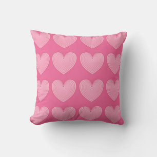 Coral pink hearts on a deep pink background cushion