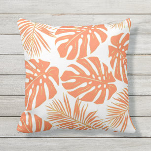 Coral tropical monstera and palm leaves pattern cushion