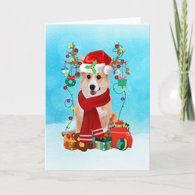 Corgi in snow with Christmas gifts Card (Front)