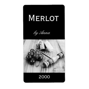 corks, corkscrew and grapes wine bottle label