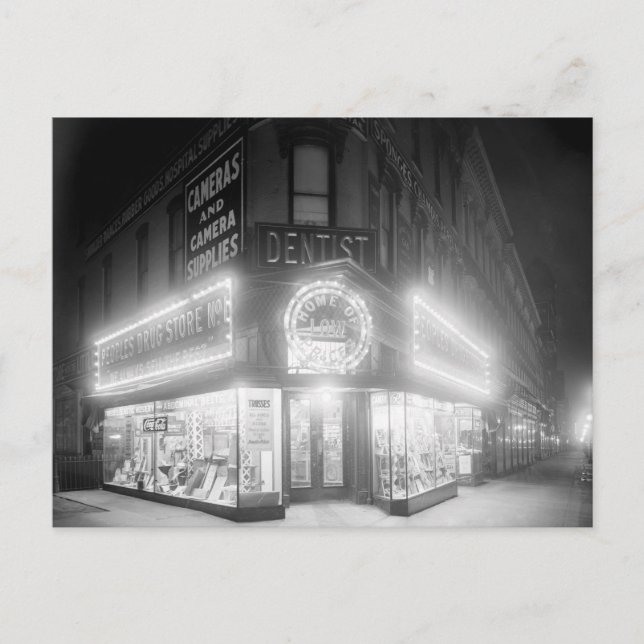Corner Store At Night, 1920 Postcard (Front)