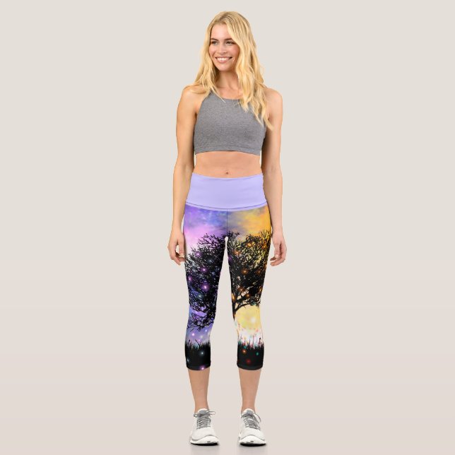 Cosmic colourful sunset with black silhouettes capri leggings (Front)