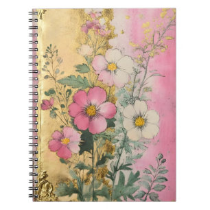 Cosmos flowers in full bloom with petals in shad notebook