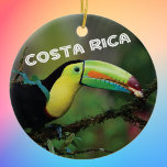 Costa Rica Toucan Ceramic Tree Decoration<br><div class="desc">Costa Rica Toucan photo commemorative ornament to celebrate happy memories of your tropical vacation. Photo of a colourful Toucan in a tree,  along with Costa Rica in fun typography. Choose your ornament shape.</div>