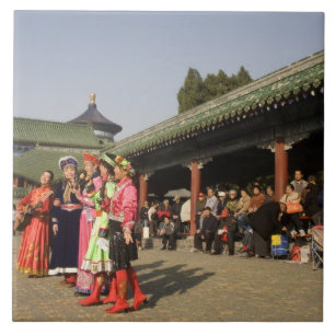 Costumed amateur folk dancers entertain tile