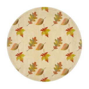 Cosy autumn maple leaves oak leaves  cutting board