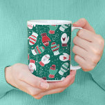 Cosy Winter Christmas Mittens Pattern in Green Coffee Mug<br><div class="desc">This novelty pattern design features hand drawn mittens with unique doodled designs on each mitten, perfect for the chilly winter season. Each adorable mitten has snowflakes, hearts, festive stripes, strings and pom poms in knitted style, and are surrounded by snowflake dots. Coloured in a classic Christmas colour palette of deep...</div>