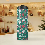 Cosy Winter Christmas Mittens Pattern in Green Thermal Tumbler<br><div class="desc">This novelty pattern design features hand drawn mittens with unique doodled designs on each mitten, perfect for the chilly winter season. Each adorable mitten has snowflakes, hearts, festive stripes, strings and pom poms in knitted style, and are surrounded by snowflake dots. Coloured in a classic Christmas colour palette of deep...</div>