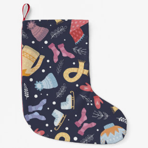 Cosy winter things on a blue background. Knitted c Small Christmas Stocking