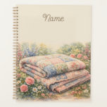 Cottagecore Floral Patchwork Quilt Watercolor Planner<br><div class="desc">A dreamy cottagecore scene unfolds through soft watercolor brushstrokes, featuring a vintage-inspired patchwork quilt surrounded by blooming garden florals. Gentle pastel hues of blush pink, dusty blue, sage green, and buttery cream create a soothing, nostalgic palette that feels both whimsical and serene. The composition evokes cosy countryside charm, blending shabby...</div>