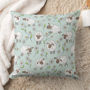 Counting sheep on sea glass blue cushion