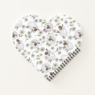 Counting sheep on white notebook