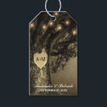 Country Rustic Vintage Carved Oak Tree Wedding Gift Tags<br><div class="desc">Country Rustic Vintage Carved Oak Tree Wedding Gift Tags - features string lights and a country,  rustic carved oak tree design with vintage flair.  Use these for thank you favour tags,  bridal showers and more!</div>