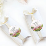 Country Wedding Pink Flower Meadow Classic Round Sticker<br><div class="desc">Wedding stickers personalised with bride and groom name and wedding date. Watercolor landscape design of countryside and with mountains and and flowers in shades of pink and green. For co-ordinating invitations, stationery and day-of-event decor, please browse my Country Meadow Collection or message me to add any additional items you need....</div>