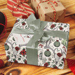 Country Western Christmas Floral Reindeer Skull Wrapping Paper<br><div class="desc">This elegant western country hand-drawn design features reindeer skulls adorned in red and cream roses with festive poinsettia flowers,  cacti,  holly and red winter berries,  all against an elegant cream background. Ideal for the holiday season or country Christmas wedding.</div>