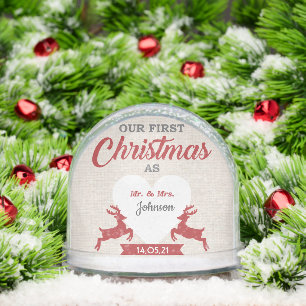 Couple first Christmas snow globe