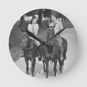 Couple Riding Horses Round Clock