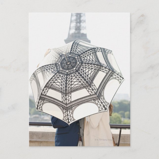 Couple under an umbrella with the Eiffel Tower Postcard (Front)