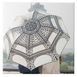 Couple under an umbrella with the Eiffel Tower Tile