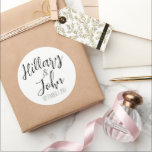 Couple's Name & Wedding Date  Classic Round Sticker<br><div class="desc">Couple's name and wedding date on a sticker to use on favours, hotel welcome bags, literally anything. Classic and sleek. Names and date are easily customised through the template design tool or you can also make further changes by fully editing the design. Any questions or if you need assistance, please...</div>