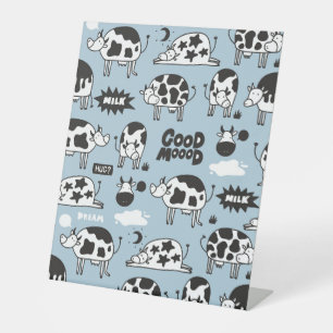 Cow and milk pedestal sign