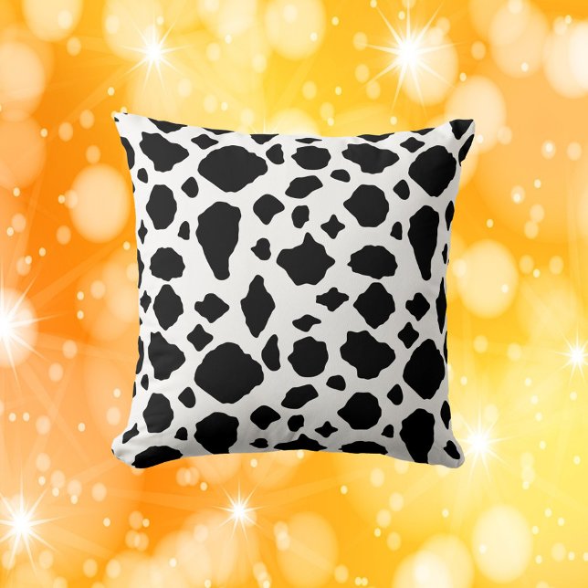 Cow Print Pattern Black and White Cushion (A throw pillow with a black and white cow pattern)