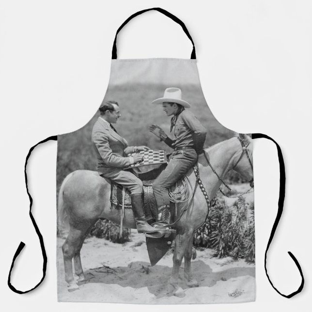 Cowboy and businessman playing checkers on horseba apron (Front)