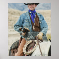 Cowboy and dog on horse