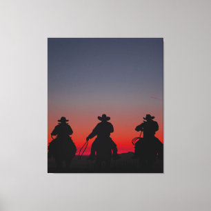 cowboy at sunset canvas print
