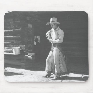 Cowboy eating from a Peter Pan peanutbutter can. Mouse Pad