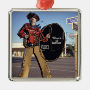 Cowboy figure sign welcoming tourists to Scottsdal Metal Tree Decoration