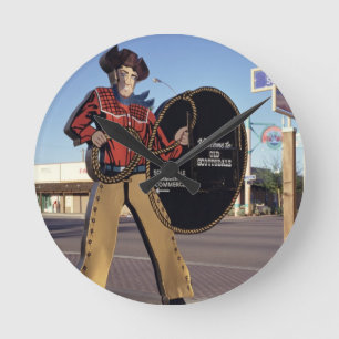 Cowboy figure sign welcoming tourists to Scottsdal Round Clock