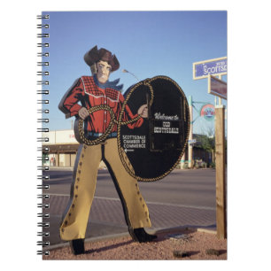 Cowboy figure sign welcoming tourists to Scottsdal Spiral Notebook