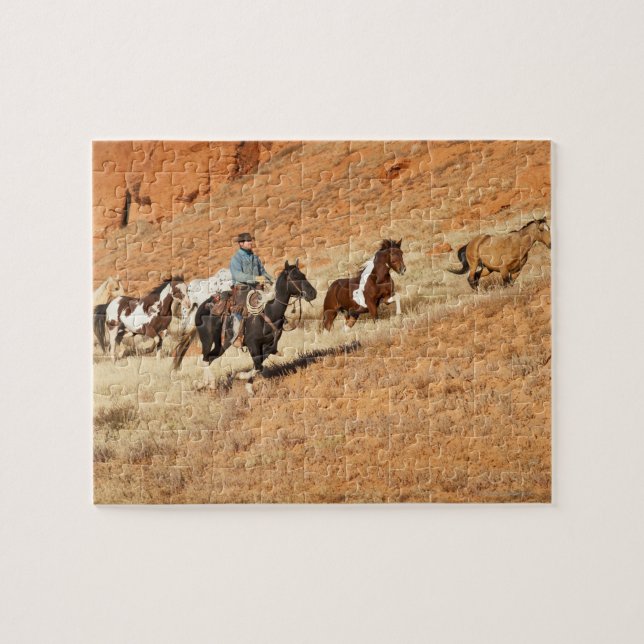 Cowboy herding horses jigsaw puzzle (Horizontal)