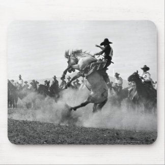 Cowboy on a bucking bronco mouse pad