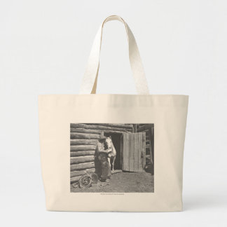 Cowboy reading a letter large tote bag