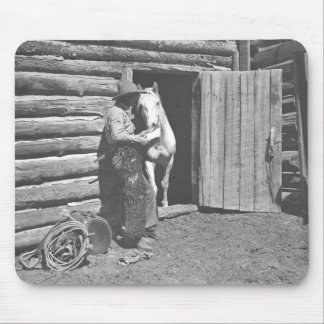 Cowboy reading a letter mouse pad