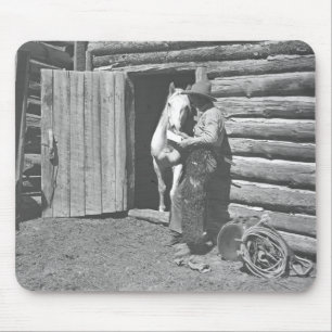 Cowboy reading a letter. mouse pad