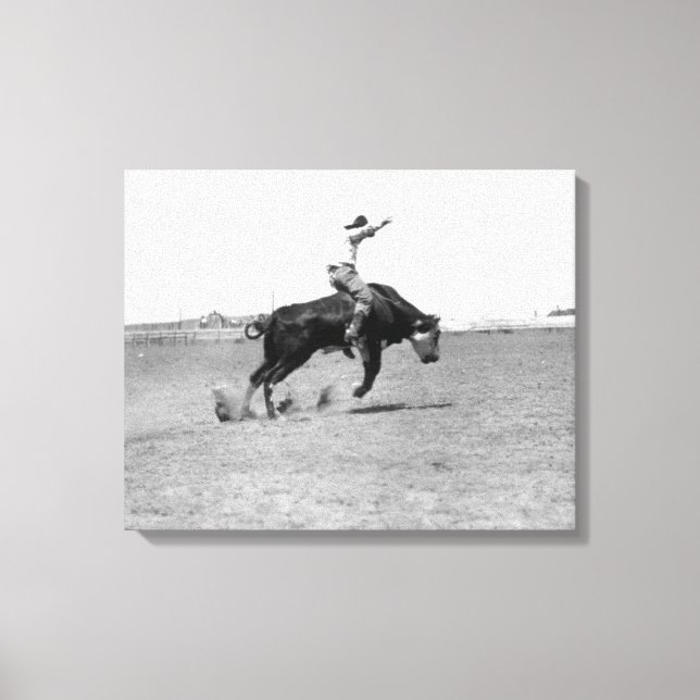 Cowboy Riding a Bucking Bull Canvas Print (Front)