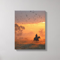 Cowboy Riding Into Fiery Sunset Art