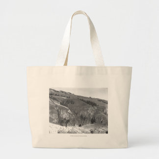 Cowboy separated from his herd. large tote bag