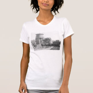 Cowboys on horses posing in front of a train T-Shirt