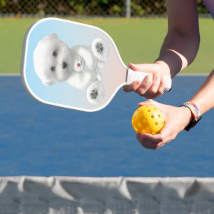 Cozy Plush Moment: Smiling Bichon Hugging Mini Pup Pickleball Paddle
