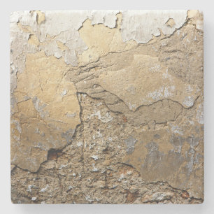 Cracked plastered wall. stone coaster