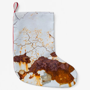 Cracked white paint, rusty car. small christmas stocking